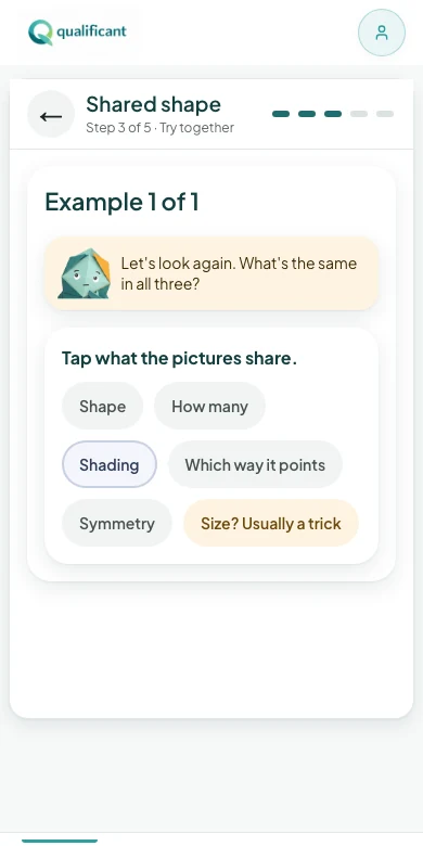 Try together: the child taps what the pictures share, with Quali's help